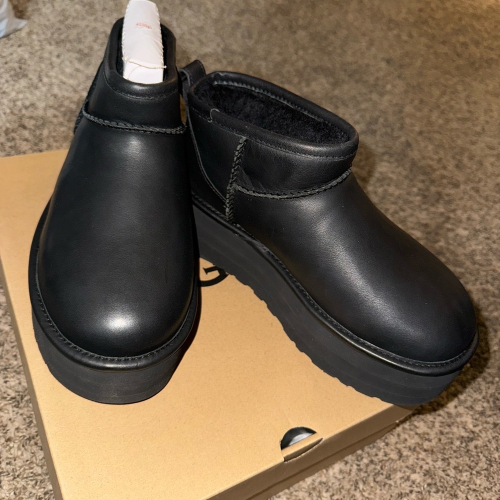 Brand new leather platform Uggs.